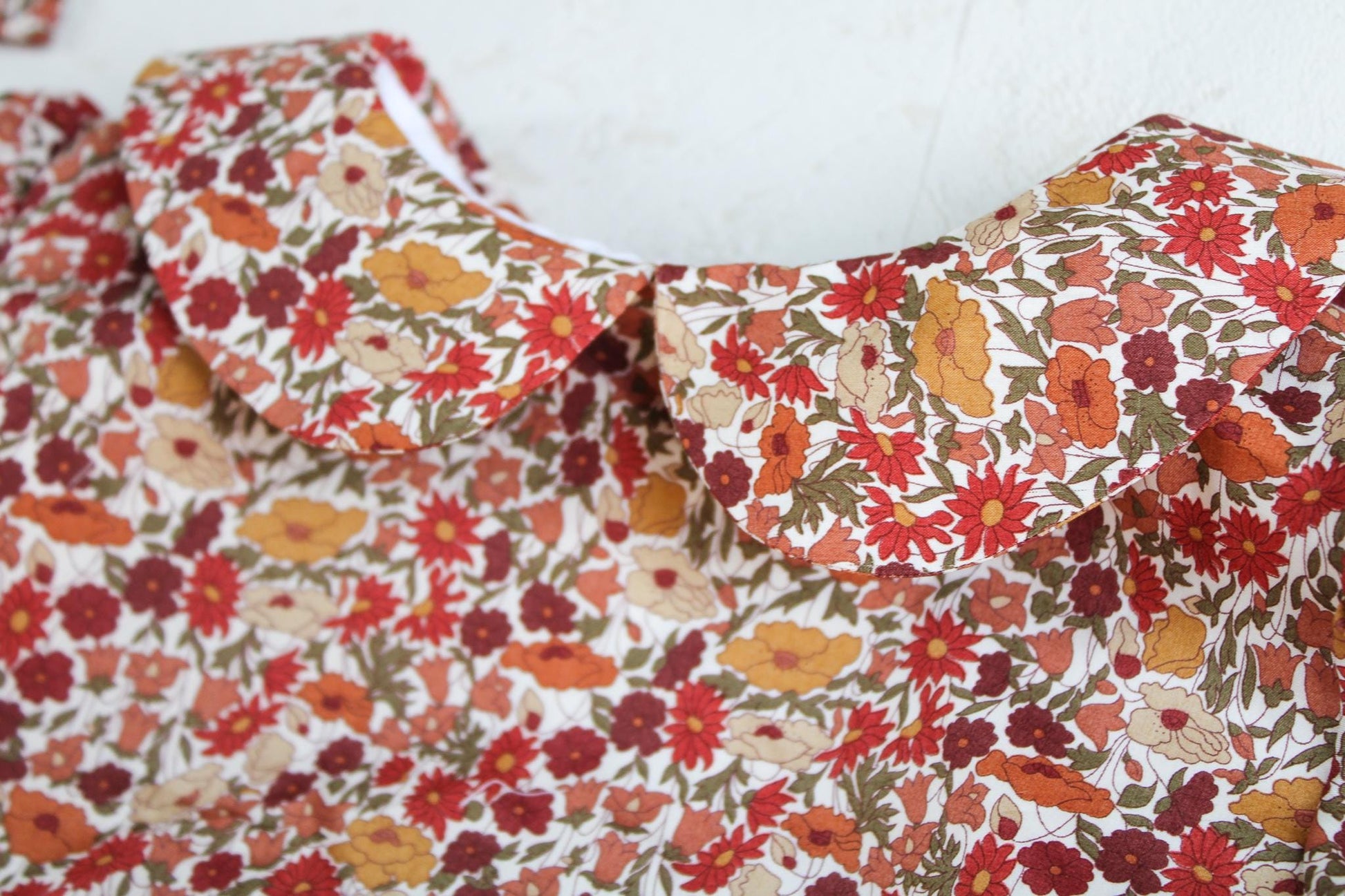 Liberty London Baby Playsuit: Long Sleeve Romper, Peter Pan Collar, Botanical Print
